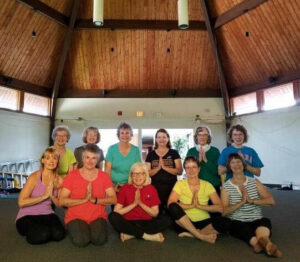 ladies in a yoga pose